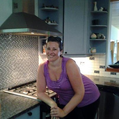 Steffanie in front of the back splash