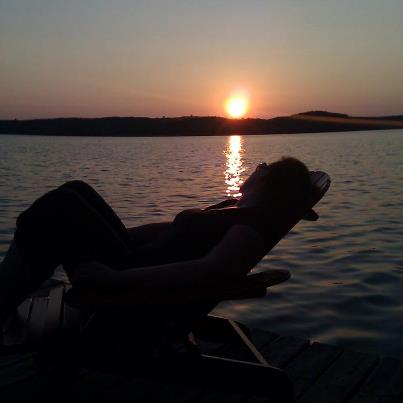 Steffanie relaxing on the dock Lake of Boys