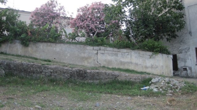 wall along driveway before