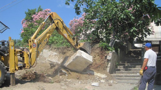 wall being pulled down